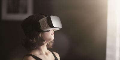 Girl looking with VR googles